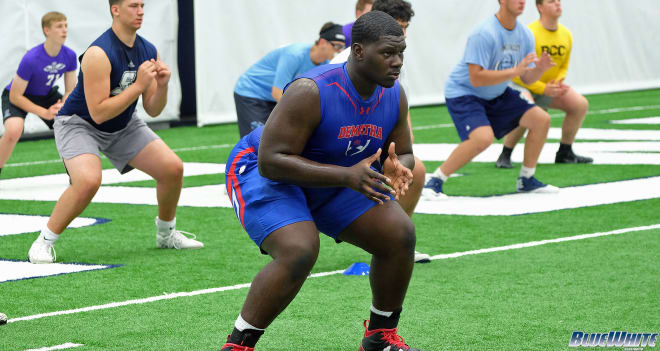 OL Golden Achumba attended a handful of camps this summer, including one of Penn State's in June. 