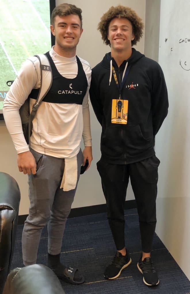 Millner (right) with Cal QB Spencer Brasch, as the 2021 Higley QB backed up Brasch in 2018