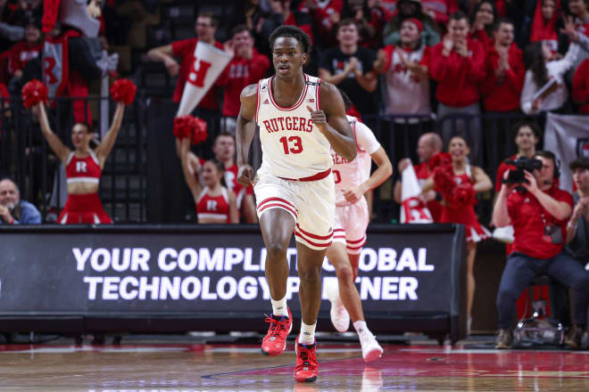 Nov 22, 2022; Piscataway, New Jersey, USA; Rutgers Scarlet Knights forward Antwone Woolfolk (13) runs up court after a basket during the first half against the Rider Broncs at Jersey Mike's Arena. 