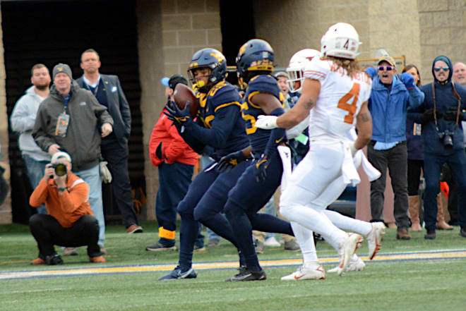 The West Virginia Mountaineers football defense closed the door on a comeback attempt. 