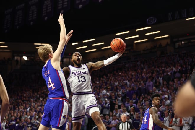 Kansas State guard Desi Sills (13) attempts a layup as Kansas guard Gradey Dick (4) contests the shot. 