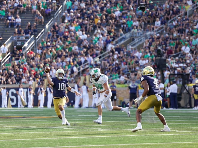 Notre Dame quarterback Drew Pyne (10) throws a pass to wide receiver Lorenzo Styles (4) against Marshall.