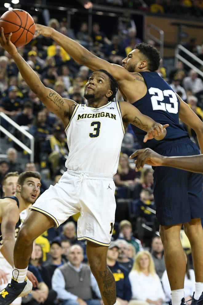 Michigan Wolverines basketball senior guard Zavier Simpson is the NCAA assists leader. 