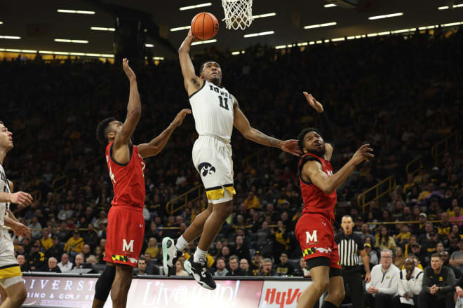 Tony Perkins finishes at the rim in Iowa's 81-67 win over Maryland. 