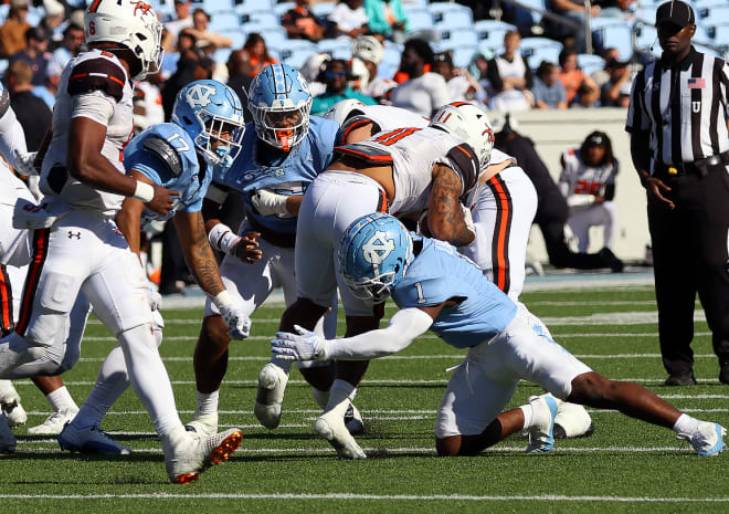 Stick Lane makes a tackle against Campbell. 