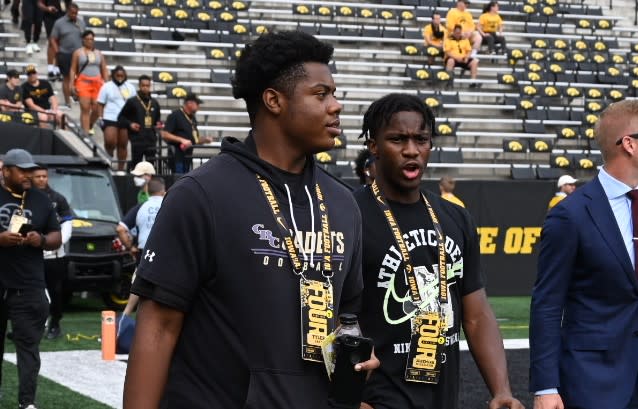 Teammates Tyler Gant and Jeremiah McClellan at Iowa vs Penn State