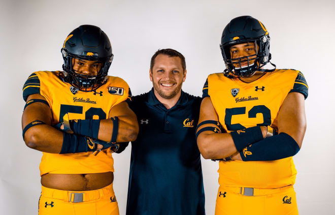 Calhoun (left), with defensive line coach Andrew Browning and fellow 2021 recruit Derek Wilkins (right)