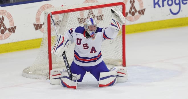 Trey Augustine makes a save with the NTDP.