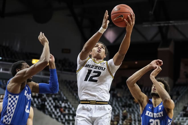 Dru Smith led all scorers with 26 points as Missouri beat Kentucky 75-70 to improve to 12-3.