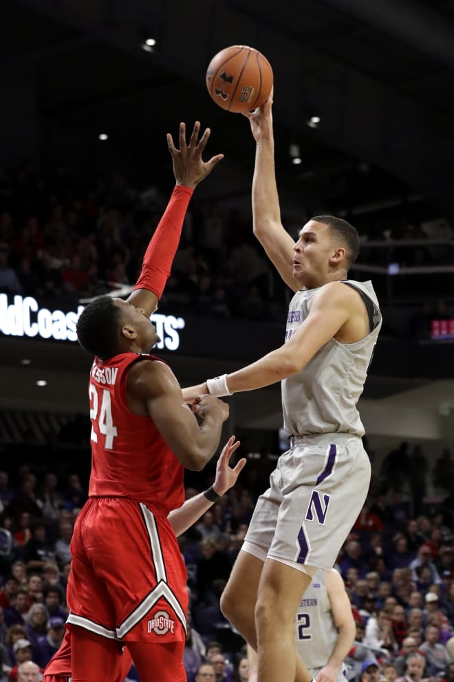 Northwestern's Pete Nance takes a hook shot over OSU's Andre Wesson.