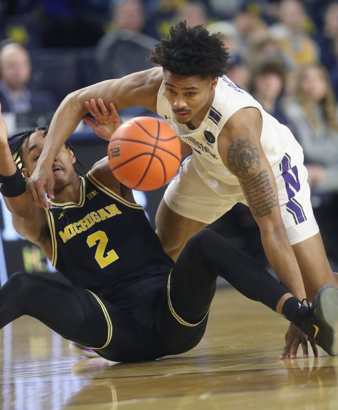 New Notre Dame guard Julian Roper II (right) announced his transfer from Northwestern on Tuesday.