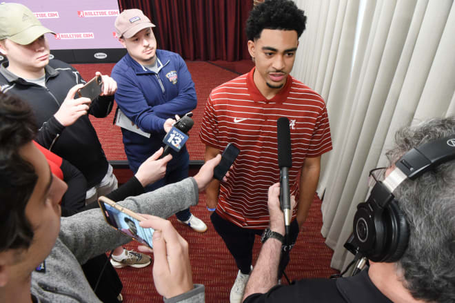 Bryce Young speaks to reporters after announcing his intention to enter the NFL draft following a press conference for University of Alabama juniors to announce their intentions. Photo | Gary Cosby Jr. / USA TODAY NETWORK