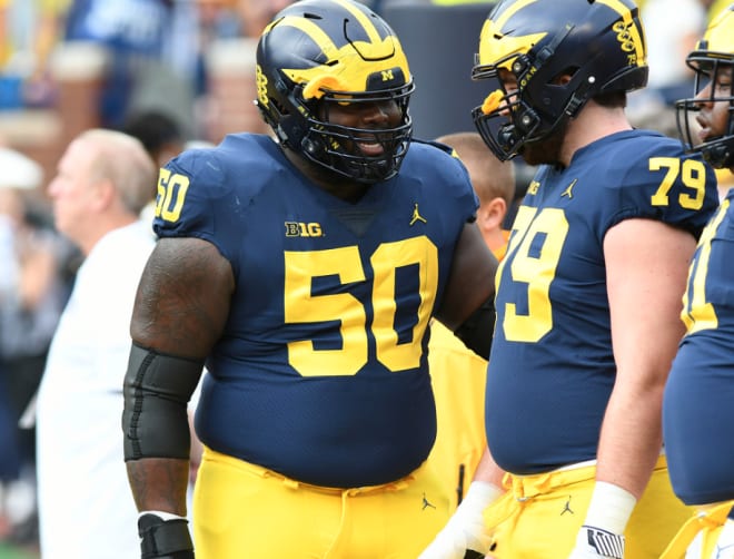 Michigan's offensive line faces a big test Saturday at Wisconsin.