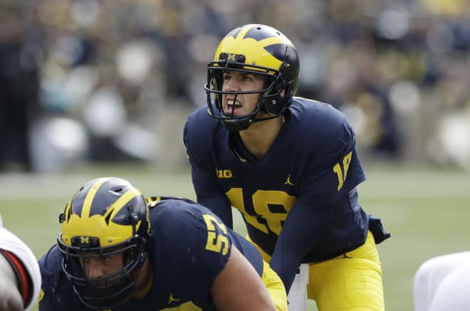 Jim Harbaugh is hopeful Brandon Peters can play Saturday against Ohio State.