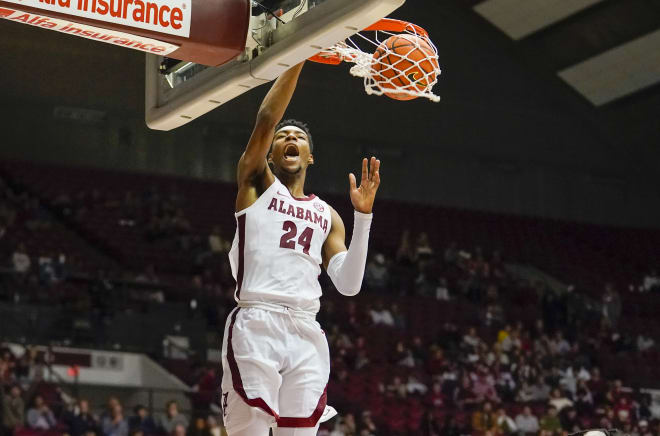 Alabama Crimson Tide forward Brandon Miller (24) goes the net against the Jackson State Tigers during the second half at Coleman Coliseum. Photo | Marvin Gentry-USA TODAY Sports