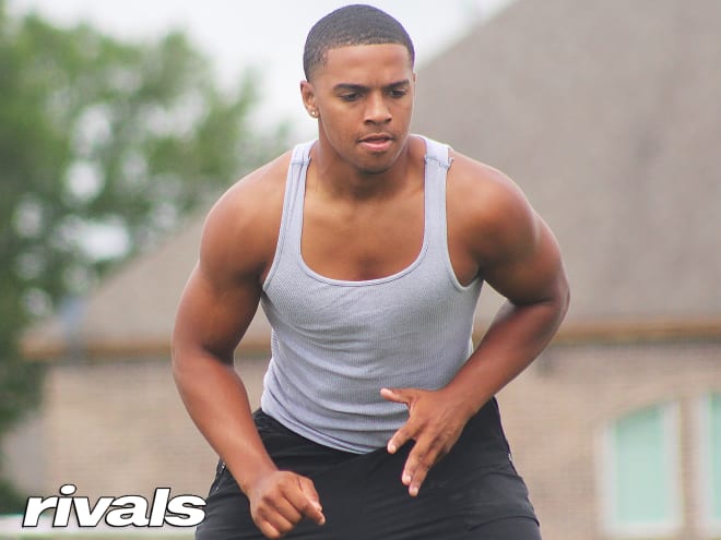 Texas defensive back Bryce Anderson holds a Michigan Wolverines football recruiting offer from Jim Harbaugh.
