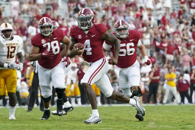 Alabama Crimson Tide quarterback Jalen Milroe (4) carries the ball against the UL Monroe Warhawks during the second half at Bryant-Denny Stadium. Photo | Marvin Gentry-USA TODAY Sports