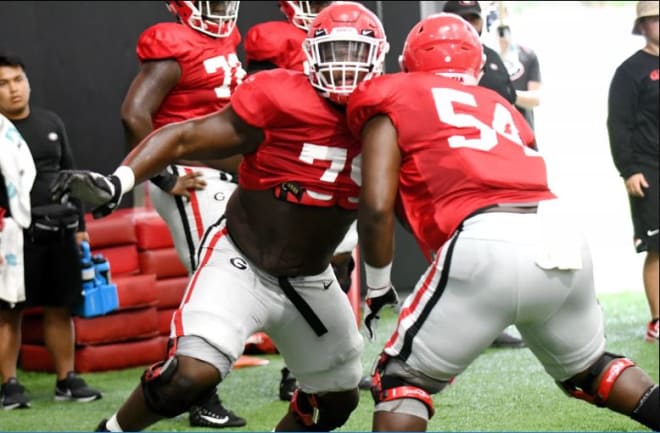 Isaiah Wilson and Justin Shaffer go at it in practice.