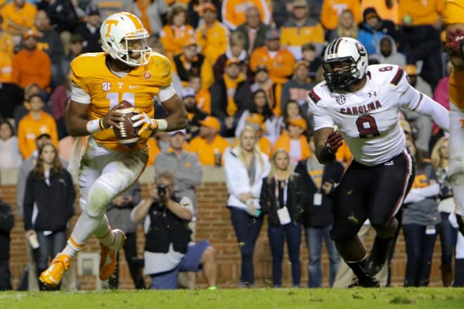 Tennessee QB Joshua Dobbs pursued by Marquavius Lewis during last year's game in Knoxville.