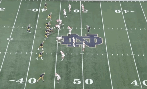 Notre Dame TE Tommy Tremble catches a pass across the middle.