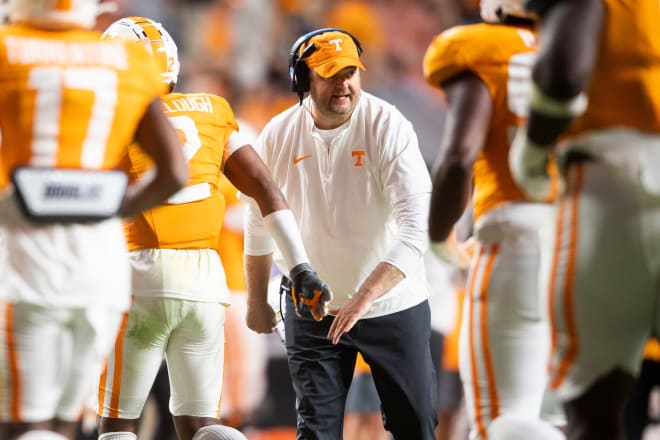 Tennessee head coach Josh Heupel high fives players as they run off the field during a football game between Tennessee and Georgia at Neyland Stadium in Knoxville, Tenn., on Saturday, Nov. 18, 2023.