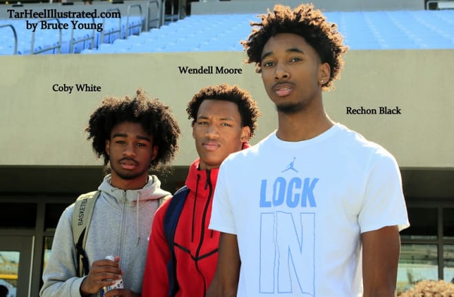 Wendell Moore (middle) with UNC commits Coby White and Rechon Black this past weekend in Chapel Hill.