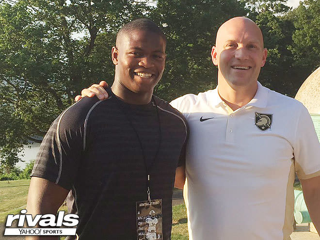 ILB prospect Arik Smith is joined by Army D-line coach Chad Wilt during Smith's summer visit to West Point