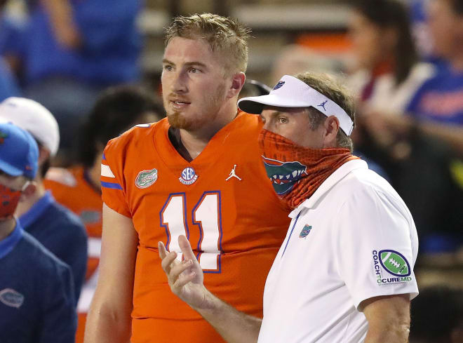 Florida coach Dan Mullen (right) with QB Kyle Trask. 