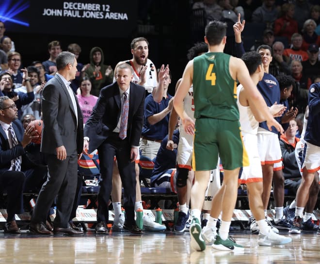 Kyle Getter (center) was hired by Tony Bennett last month to move into a full-time assistant role.