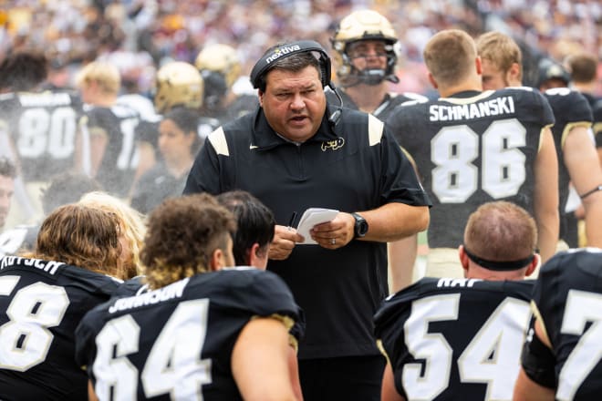 Mitch Rodrigue speaks with players during the Buffs' week two game against Texas A&M