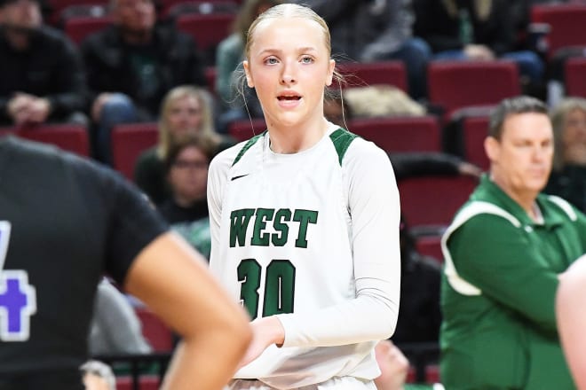 Senior Noah Gessert (30) and her Millard West team in Class A are one of six (and that's all there are) top seeds to make today's girls state basketball tournament finals.