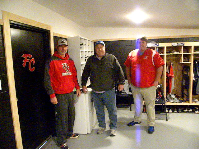 Faith Christian supporters Mike Pannell, Kelly Webb & Brandon Gallion show off new Patriot baseball fieldhouse