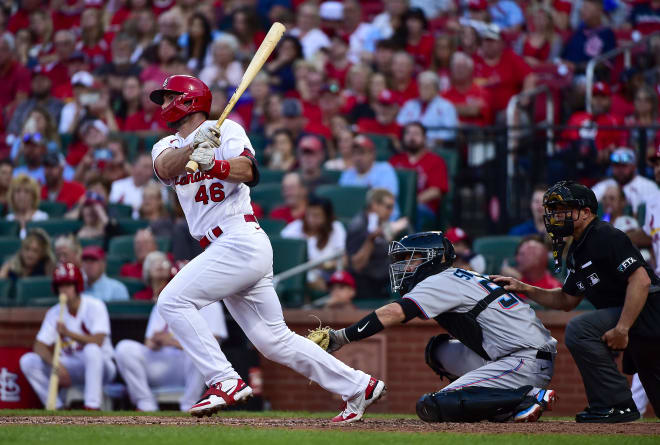 St. Louis Cardinals first baseman Paul Goldschmidt (46) hits a single against the Miami Marlins during the fourth inning at Busch Stadium. Mandatory Credit: Jeff Curry-USA TODAY Sports