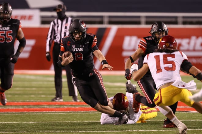 Utah Utes quarterback Jake Bentley (8) is tackled by USC Trojans linebacker Hunter Echols (31) while running up the field during the second half at Rice-Eccles Stadium. USC Trojans won 33-17. Photo Credit: Chris Nicoll-USA TODAY Sports