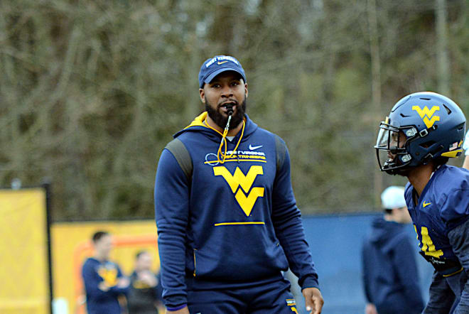 WVSports - West Virginia WR coach Washington looks to use background to  build up