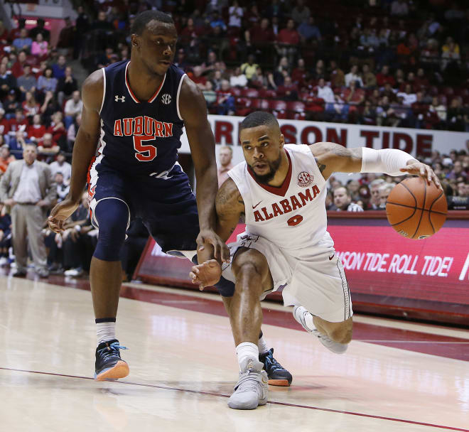 Alabama's Corban Collins (3) dribbles the ball guarded by Auburn's Mustapha Heron (5) during a game at Coleman Coliseum in Tuscaloosa Saturday, Feb. 4, 2017. Auburn won the game by a score of 82-77. Staff Photo/Erin Nelson