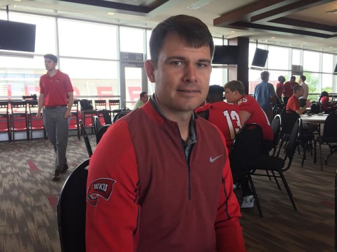 WKU offensive coordinator and quarterbacks coach Bryan Ellis poses for a photo on Tuesday, July 30 at Media Day.