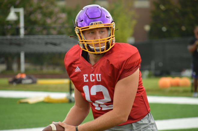 Quarterback Holton Ahlers (pictured on Wednesday) leads East Carolina's offense into Raleigh on Saturday against N.C. State.
