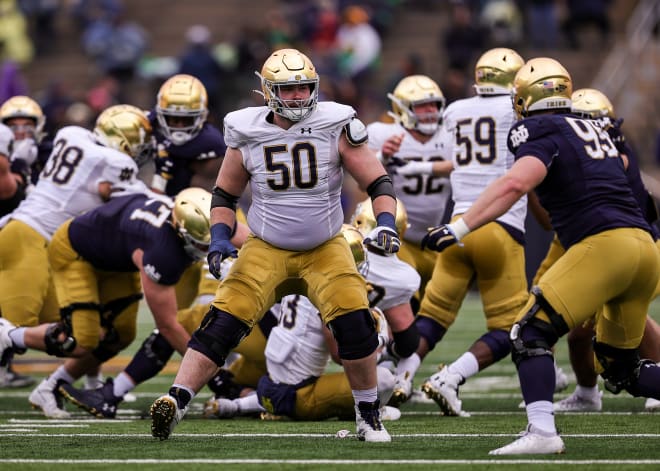 Junior Rocco Spindler (50) has worked his way into the thick of the competition for Notre Dame's starting left guard spot.