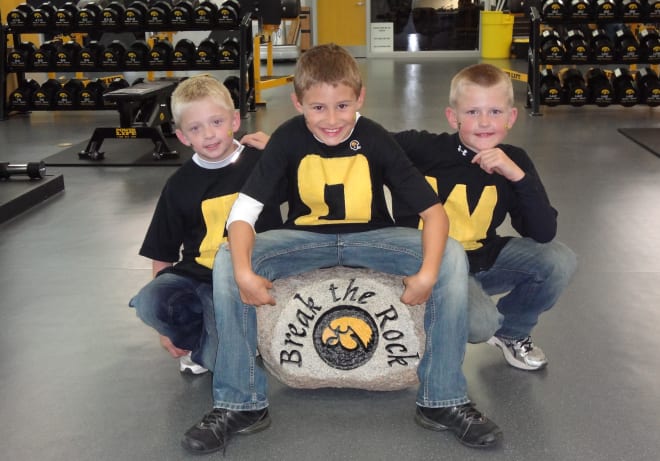 A young Brody Brecht, center, with friends Kaden Davis and Weston Fulk in Iowa City in 2011. (Brecht family)