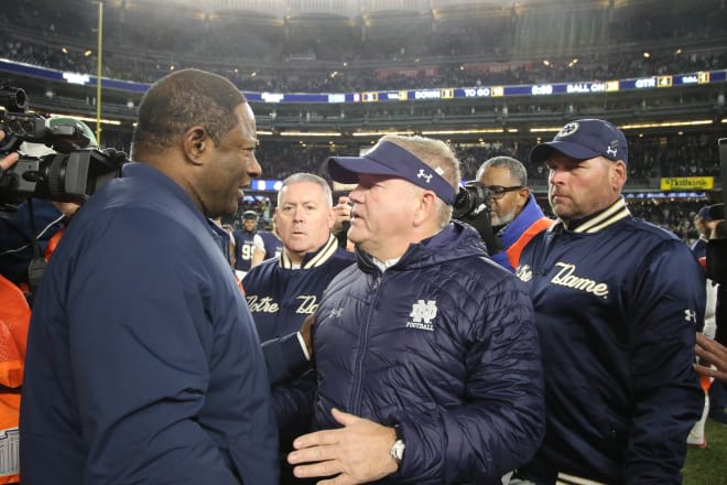 Notre Dame football head coach Brian Kelly with Syracuse head coach Dino Babers in 2018