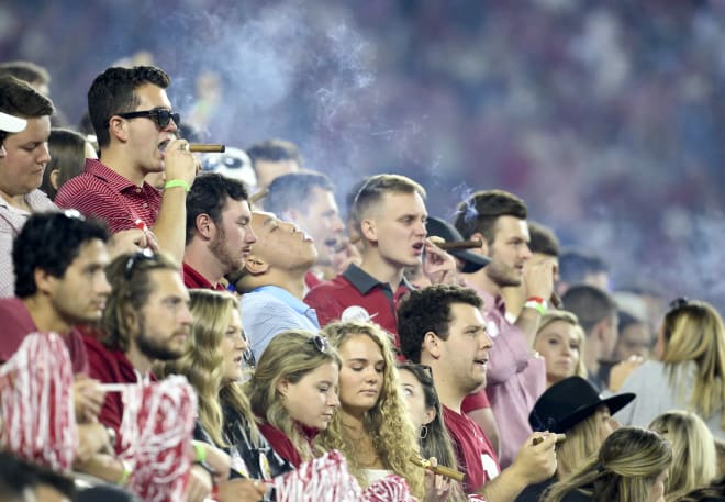 Alabama Crimson Tide fans celebrate with the traditional postgame cigar after a victory over the Tennessee Volunteers at Bryant-Denny Stadium. Alabama won 52-24. Photo | USA TODAY