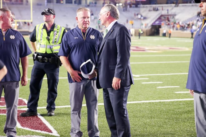 Notre Dame Fighting Irish football head coach Brian Kelly and director of athletics Jack Swarbrick