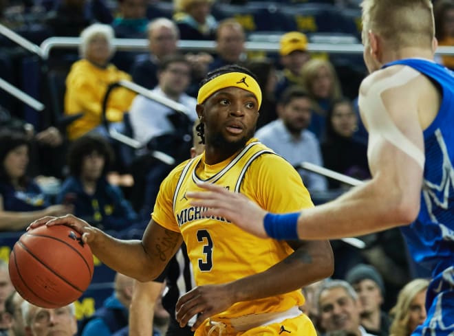 Zavier Simpson scored xx points to help lead Michigan to a win over Creighton. 