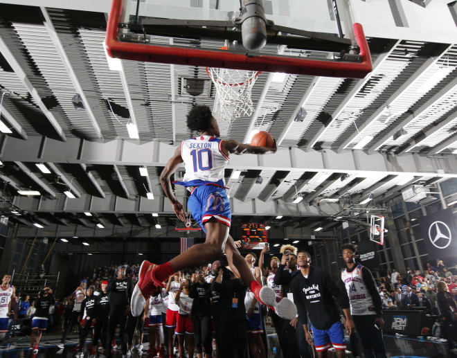 McDonald's All-American guard Collin Sexton (10) dunks during the McDonald's High School All-American Powerade Jamfest at the Keating Sports Center at Illinois Institute of Technology. Mandatory Credit: Brian Spurlock-USA TODAY Sports