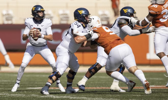 West Virginia offensive lineman Zach Frazier (54) has been among the Mountaineers' top performers up front in 2020.