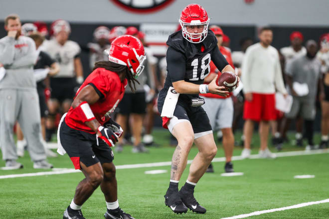 JT Daniels is battling what's believed to be an oblique injury.