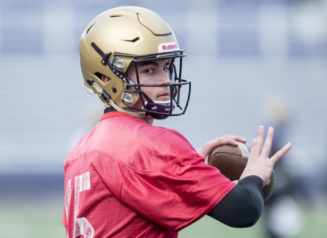 James Madison freshman quarterback Gage Moloney throws at the team's practice on March 13 in Harrisonburg.