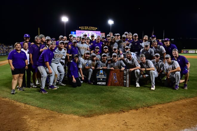 LSU poses with the Super Regional championship trophy after Sunday's win over Kentucky. One of LSU coach Jay Johnson's traditions is having his team pose for a picture after every win all season from start to finish.