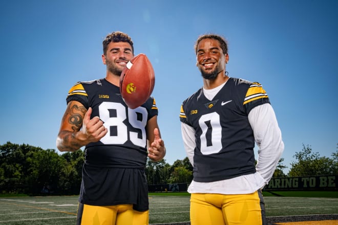 Nico Ragaini (L) and Diante Vines (R) are the two starting wide receivers on Iowa's pre-Week 1 depth chart. 